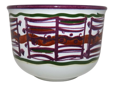 Royal Copenhagen art pottery
Unique round bowl with purple decoration