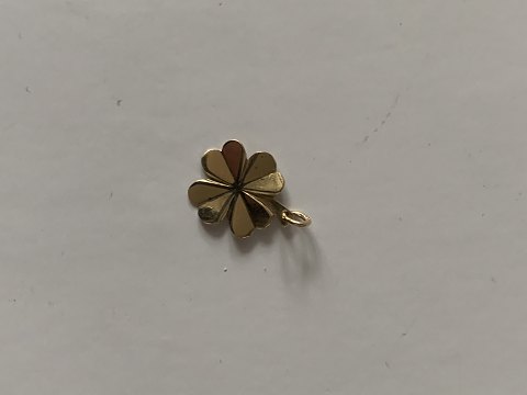 Four-leaf clover in 14 carat gold
Stamped 585
Measures 12.92 mm approx
With the awl 17.00 mm approx
Thickness 0.40 mm