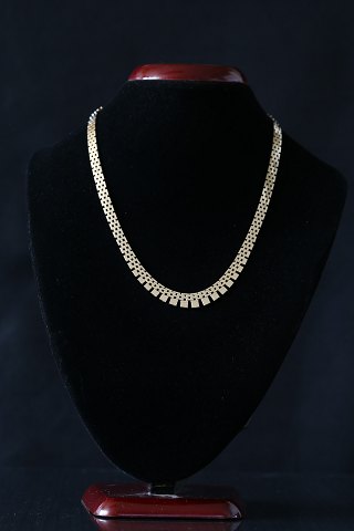 Gold necklace in 14 carat gold. Beautiful classic necklace, built like bricks in 
5 rows.