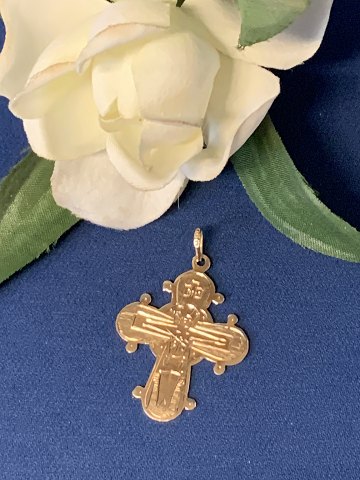 Daymark cross in 14 carat gold, stamped 585.
Classic jewelry.