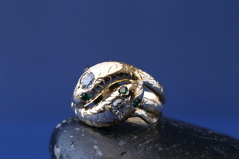 Unisex gold ring in 14 carat gold, with a unique and beautiful snake motif, size 
60. The stamp, 585 JH
SOLD