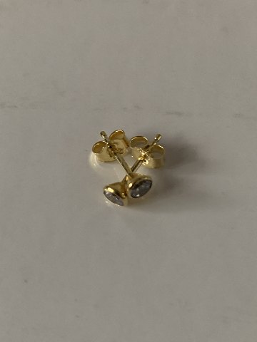 8 karat Guld øreringe
med klar sten, stemplet 333 AKZ