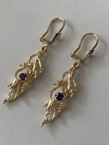 Gold earrings in 14 carat gold, with purple stones and stamped 585 HS