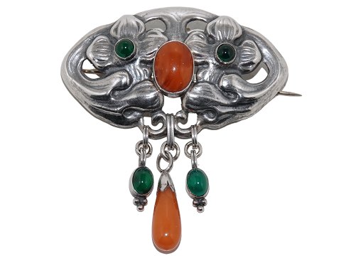 Hertz sølv
Stor Art Nouveau broche med rav og grønne sten fra ca. 1900-1910