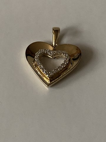 Pendant 9 carat gold, designed as a Heart
with embedded stones.