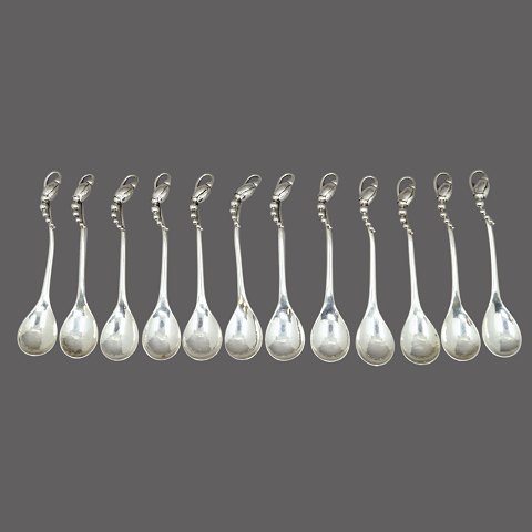 Georg Jensen; Set of 12 Magnolia/Blossom coffee spoons of sterling silver