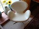 Swan chair in white leather designed by Arne Jaboksen jubilærumsmode 5000 m2 
showroom