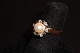 White gold pearl ring 14k gold with 6 diamonds a 0.3 cultured pearl in pink 
color size 55 5000 m2 showroom