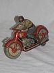 Tin toys
Man on a Motorcycle