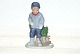 Royal Copenhagen Figurine, Peter (Boy with Christmas tree on the toboggan) 2005