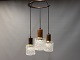 Loftlampe i palisander og kunstglas. Lampen er af Dansk Design fra 1960erne. 
5000m2 udstilling.