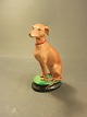 Gammel hunde figur i porcelæn