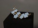 Simpel flower brooch in blue enamel and in gilded 925 sterling silver.
5000m2 showroom.