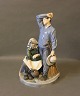 Large porcelain figurine, Man with Scythe and wife by Royal Copenhagen.
5000m2 showroom.