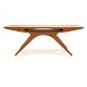 Table, Danish Design by Johannes Andersen: "The Smile", teak. Circa 1957. H: 
51cm. L: 134cm. W: 51cm