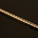 Tennisarmband. Reich geschmückt mit Diamanten. 10kt Gold. L: 20,5cm. G: 10,2gr