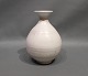 Vase with white glaze by Svend Hammershøj for Herman A. Kähler.
5000m2 showroom.