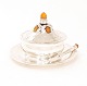 A Georg Jensen Silver bowl with tray. Tray and knife mounted with amber. Period 
1925-32. Dated 1932. H: 12cm. D tray: 18cm. W: 525gr