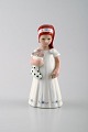 Rare Royal Copenhagen porcelain figurine. Girl with christmas stocking and 
gingerbread man. Model number 093.