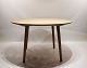 Round dining table of soap treated oak of danish design.
5000m2 showroom.