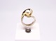 Ring of 14 carat gold decorated with cultured pearl.
5000m2 showroom.