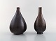 Wallåkra. Two vases in glazed stoneware. Beautiful glaze in brown shades. 
Swedish design 1950