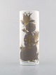 Bjørn Wiinblad for Rosenthal Studio Line. Porcelain vase decorated with woman 
and flowers. 1980