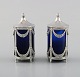 Swedish silversmith. Salt / pepper set in empire style with royal blue glass 
inserts.