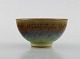 Anders Dolk. Hedemora, Sweden. Unique bowl in glazed ceramics. Beautiful glaze 
in blue and green shades. Late 20th century.
