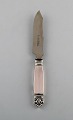Georg Jensen "Acanthus" cheese knife in silver, blade in steel. Dated 1923.
