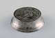 Ballin / Hertz, Denmark. Art nouveau lidded box in pewter decorated with young 
girl. Ca. 1920.
