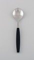 Henning Koppel for Georg Jensen. Strata sorbet spoon in stainless steel and 
black plastic. 1960 / 70s. 25 pcs in stock.
