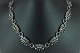 Georg Jensen, Lene Munthe; A necklace of sterling silver with 18k gold #394