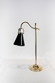 Table lamp of brass in Jugend style and with green opaline glass shade from the 
1930s.
5000m2 showroom.