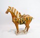 Large ceramic horse glazed in dark yellow nuances from China around the 1920s.
5000m2 showroom.