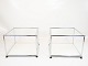 A pair of italian side tables in glass and frame of chrome, in great vintage 
condition.
5000m2 showroom.