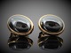 Ole Lynggaard; A pair of earclips of 14k gold and hematite