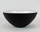 Krenit bowl by Herbert Krenchel of black metal and white enamel from the 1960s.
5000m2 showroom.