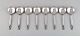 Eight Georg Jensen Acorn boullion spoons in sterling silver.
