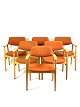 Seks armstole i eg og polstret med orange uldstof designet af Erik Kirkegaard 
fra 1960erne. 
5000m2 udstilling.
Flot stand
