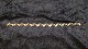 Elegant armbånd i 14 karat Guld
Stemplet  585
Længde 19 cm
