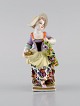 Augustus Rex, Germany. Antique hand-painted porcelain figure. Girl with flowers 
and fruit. 19th century.

