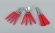 Gense, Sweden. "Holiday" cutlery for four people in stainless steel and red 
melamine plastic.