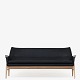 Roxy Klassik præsenterer: Ib Kofod-Larsen / Matzform'Wing' sofa i sort læder med stel i eg.2 stk. på ...