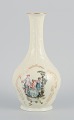 Rosenthal, Germany. "Sanssouci", cream colored vase decorated with figures and 
gold decoration.