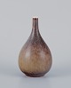 Carl Harry Stålhane for Rörstrand, small narrow-necked ceramic vase with glaze 
in green-brown tones.
