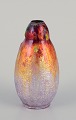 A. Marty for Limoges, France.
Enamelwork vase with polychrome enamel decoration.