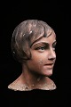 Decorative, old mannequin head of a woman from the 30s in painted plaster and 
papier mache...