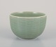 Axel Salto (1889-1961) for Royal Copenhagen. Ceramic bowl with ribbed 
decoration. Celadon glaze.