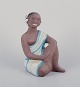 Mari Simmulson (1911-2000), for Upsala-Ekeby, Sweden.
Rare ceramic figurine of a half-naked Tahitian woman.